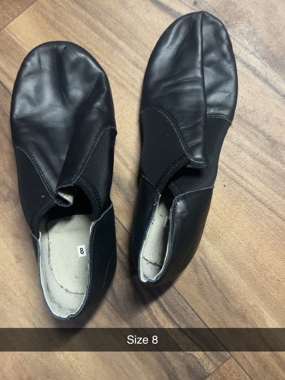 Dansko Women's Black Slip-On Athletic Shoes